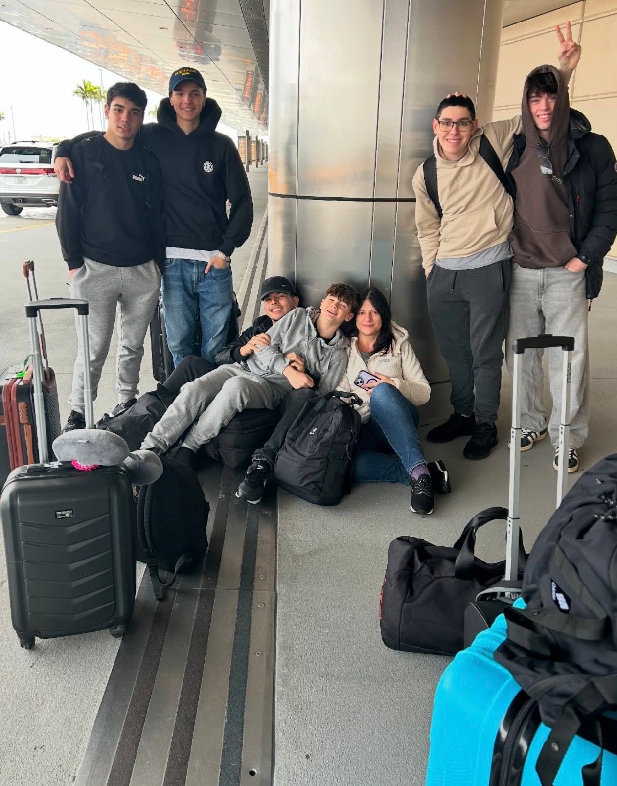Host mom and students at the airport